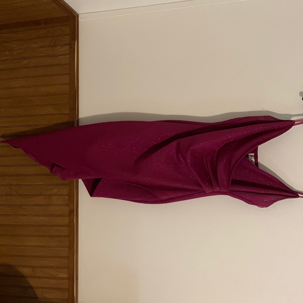 Purple sparkly prom dress. Adjustable straps sized medium.
